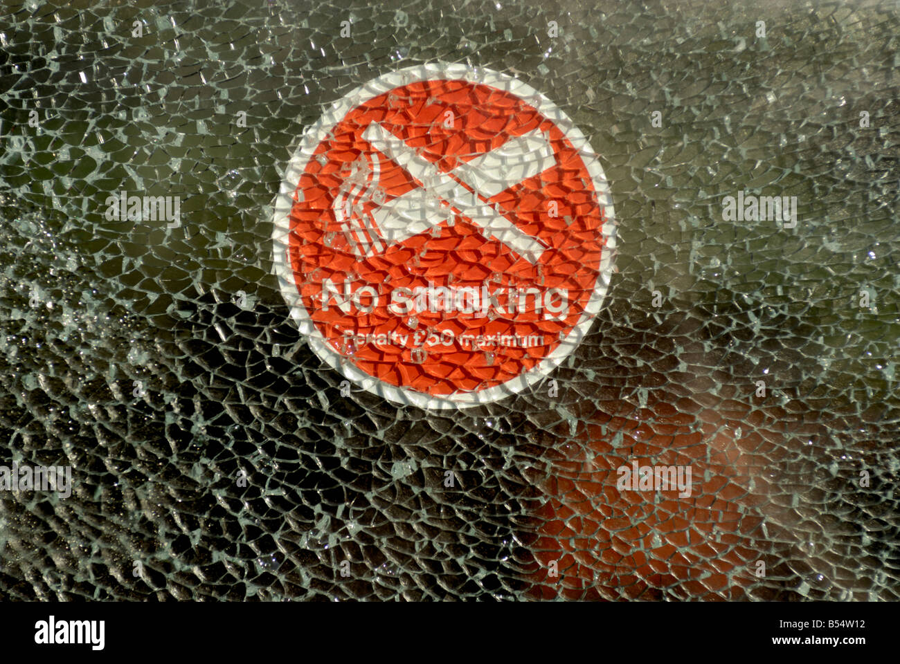 no smoking sign on broken window Stock Photo Alamy