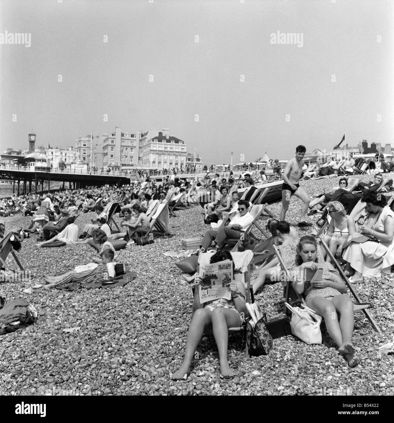 Crowded scenes on Brighton Beach as holidaymakers enjoy the hot summer weather. &#13;&#10;June 1960 &#13;&#10;M4327-006 Stock Photo