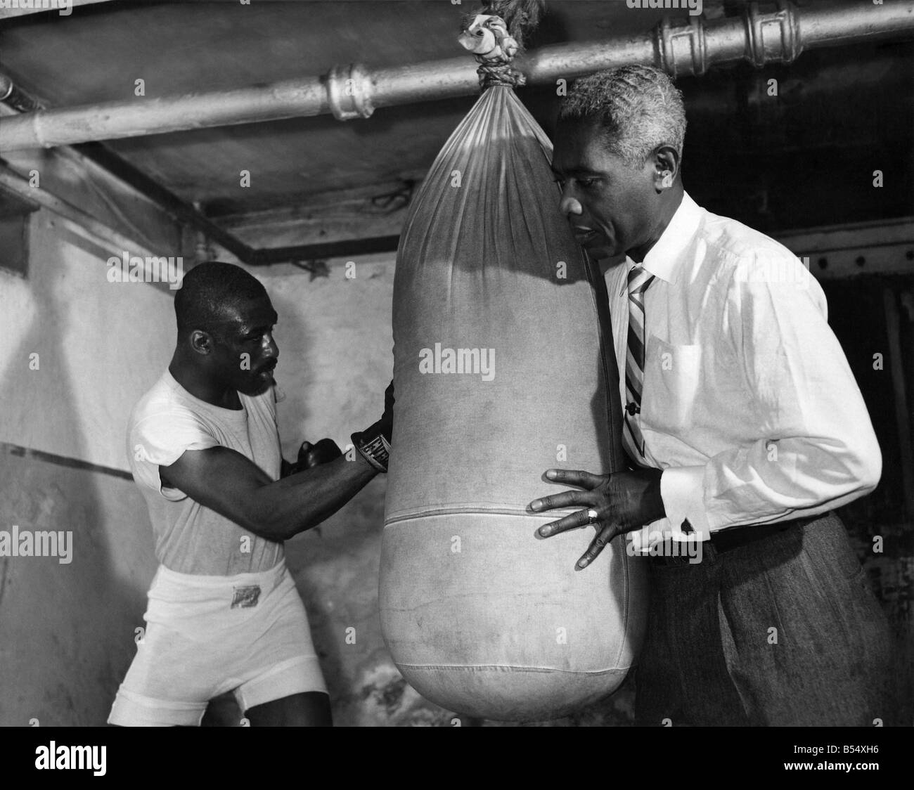 Randy Sandy and Mgr Syd Martin. March 1959 P011478 Randy Sandy.
Boxer.
birth date Stock Photo