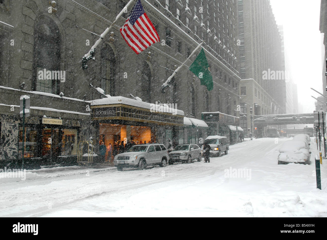 outside the roosevelt hotel during a winter snow storm madison avenue nyc Stock Photo
