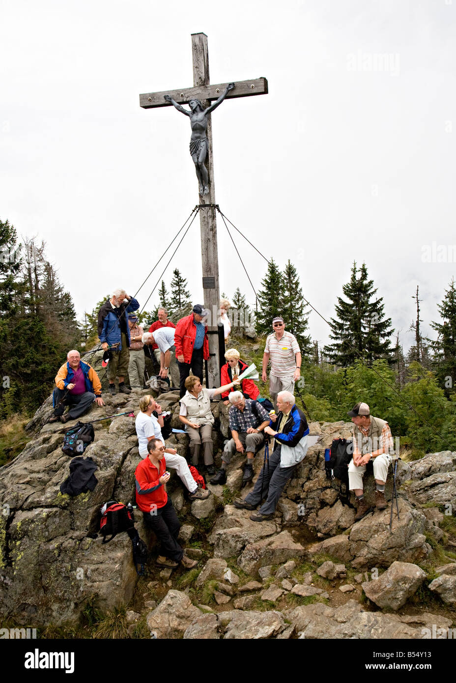 Walking group at summit of Grosse Rachel Bayerischer Wald national park Bavaria Germany Stock Photo