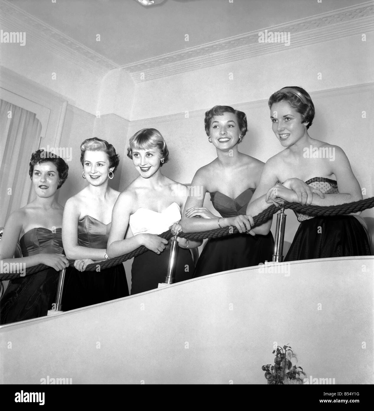 Woman: Beauty: Models: Some very pretty girls work for a big London hairdresser but Mr. Raymond has banned them from entering any form of beauty competition while employed at the hairdresser. September 1953 D5825 Stock Photo