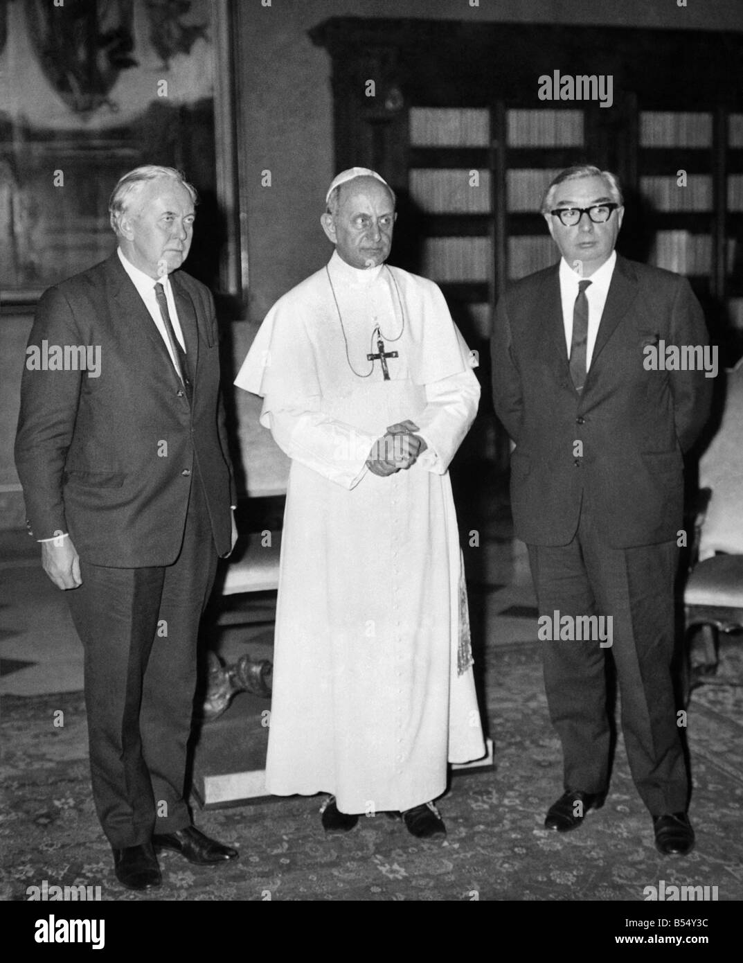 This was the grave and historic moment in Rome last week when his Holiness Pope Paul met British Prime Minister Harold Wilson and Foreign Secretary George Brown. The three talked together for 45 minutes and (top right) exchanged gifts. Then, in the Vatican, they pose for this picture.;January 1967 ;P011315 Stock Photo