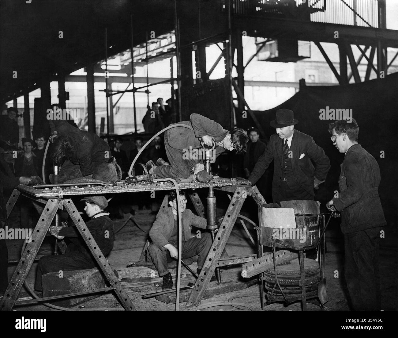 Training young riveters at a Scottish Shipyard during the Second world war. May 1942 P011680