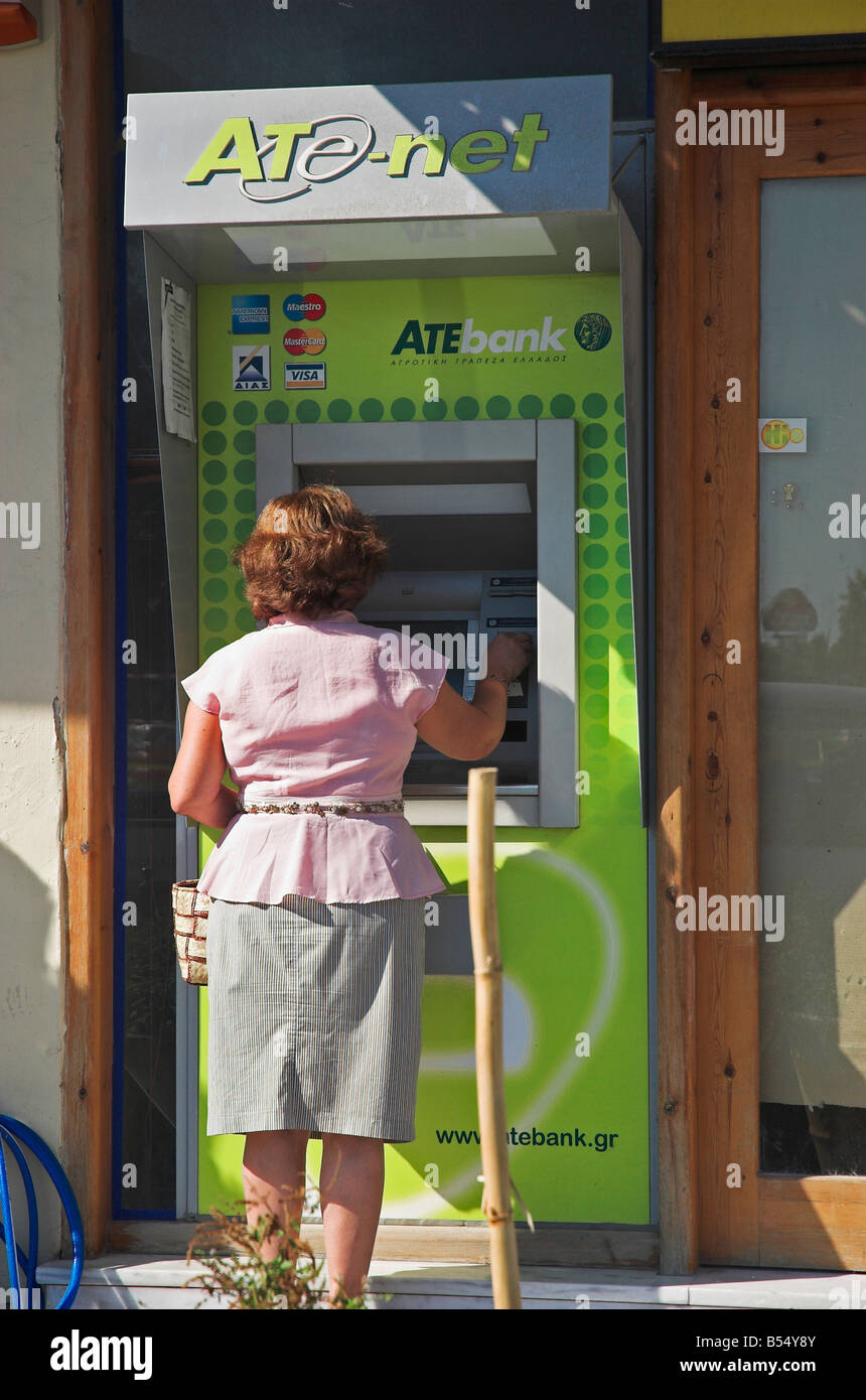 Woman tourist using atm machine hi-res stock photography and images - Alamy