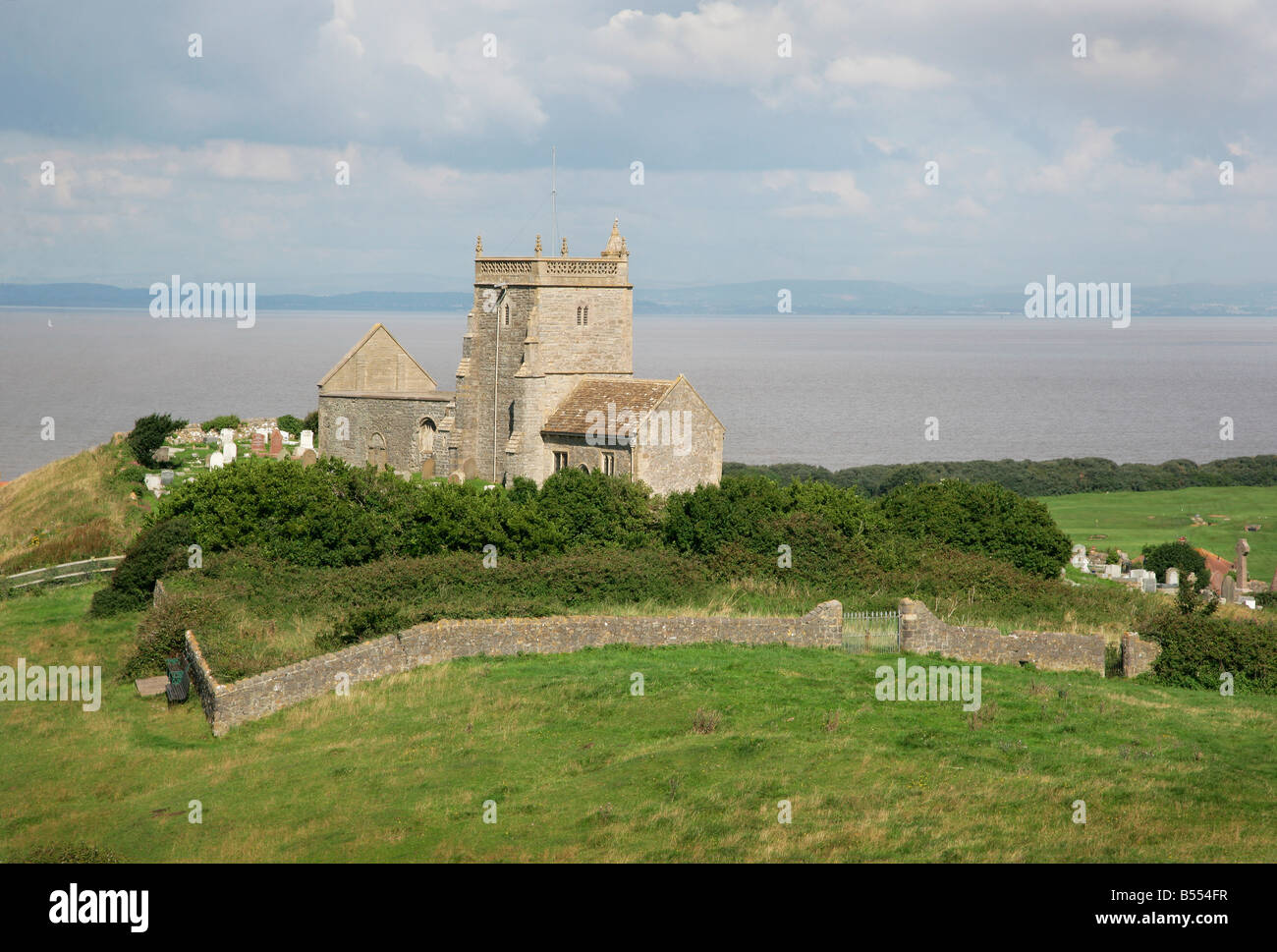 Old Church of St Nicholas at Uphill near Weston super Mare Somerset with the Severn estaury beyond Stock Photo