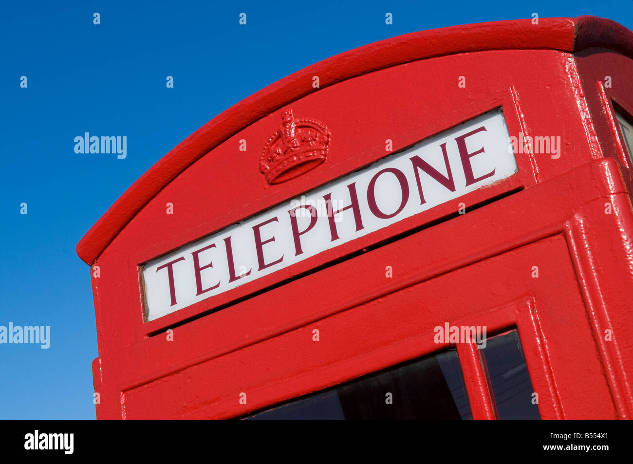 red british telephone call box in norfolk, england Stock Photo