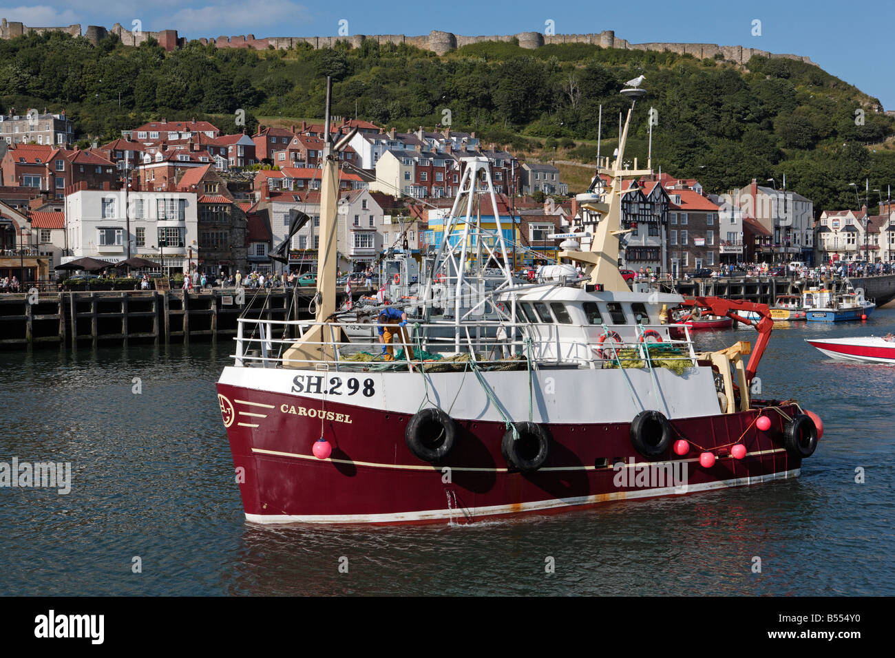 Fishing Boat entering Scarborough Harbour Stock Photo - Alamy