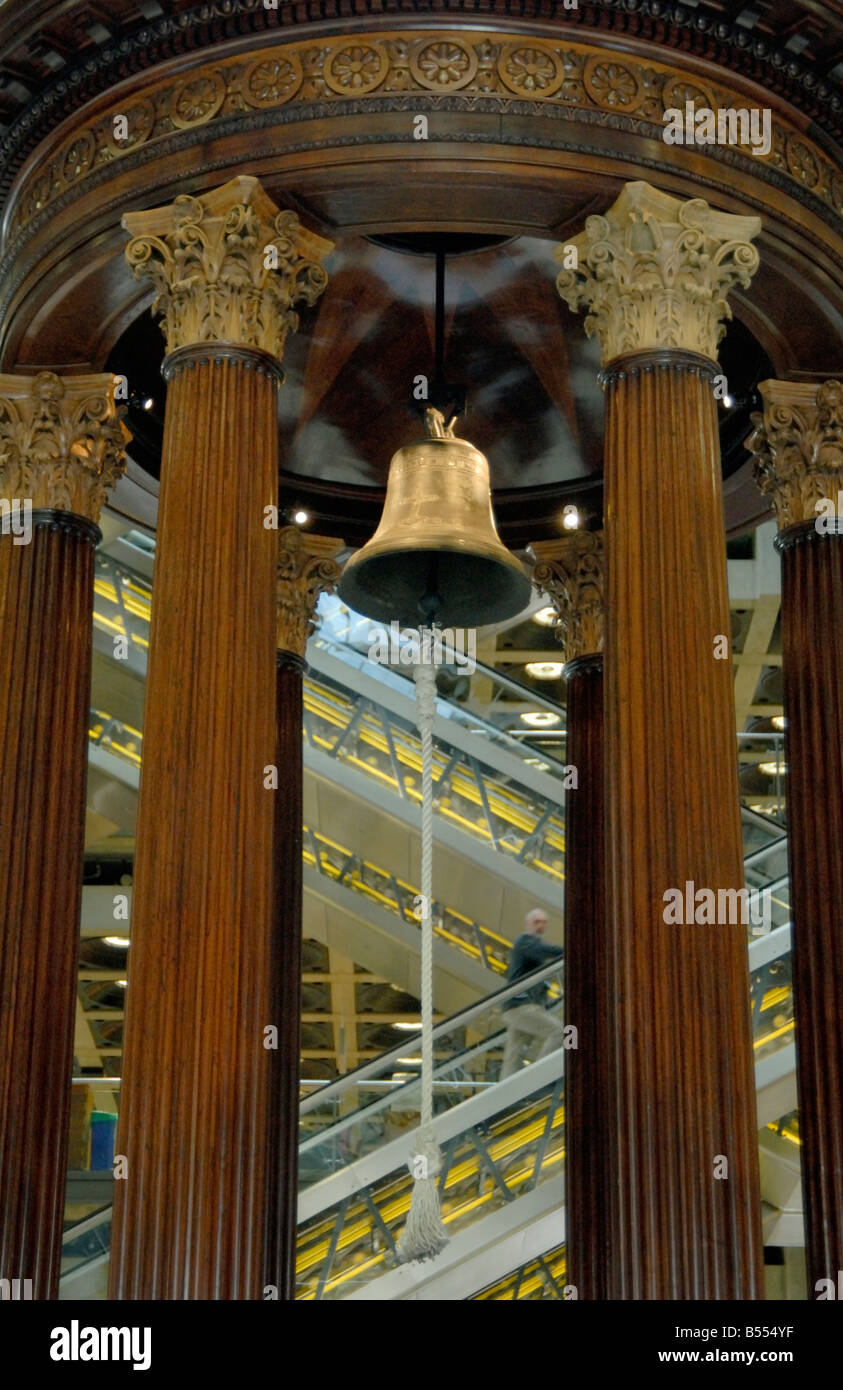 Famous Lutine Bell hanging in The Rostrum in the Underwriting Room at the heart of the Lloyd's Building, City of London, England Stock Photo