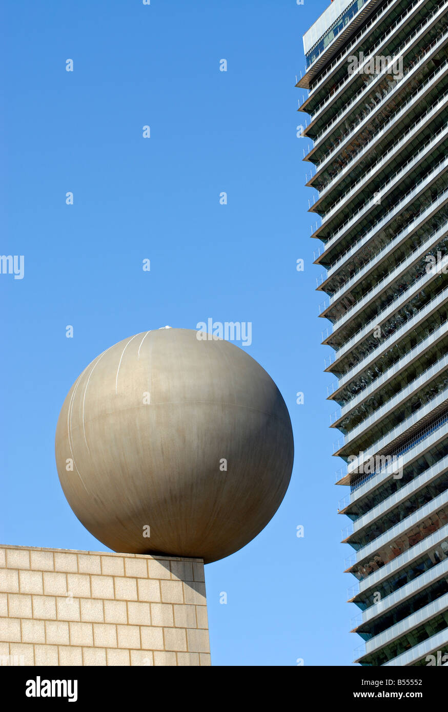Frank Gehry s Sphere Esfera Sculpture and Mapfre Tower Building at Port Olimpic Barcelona s Waterfront Catalonia Spain Stock Photo