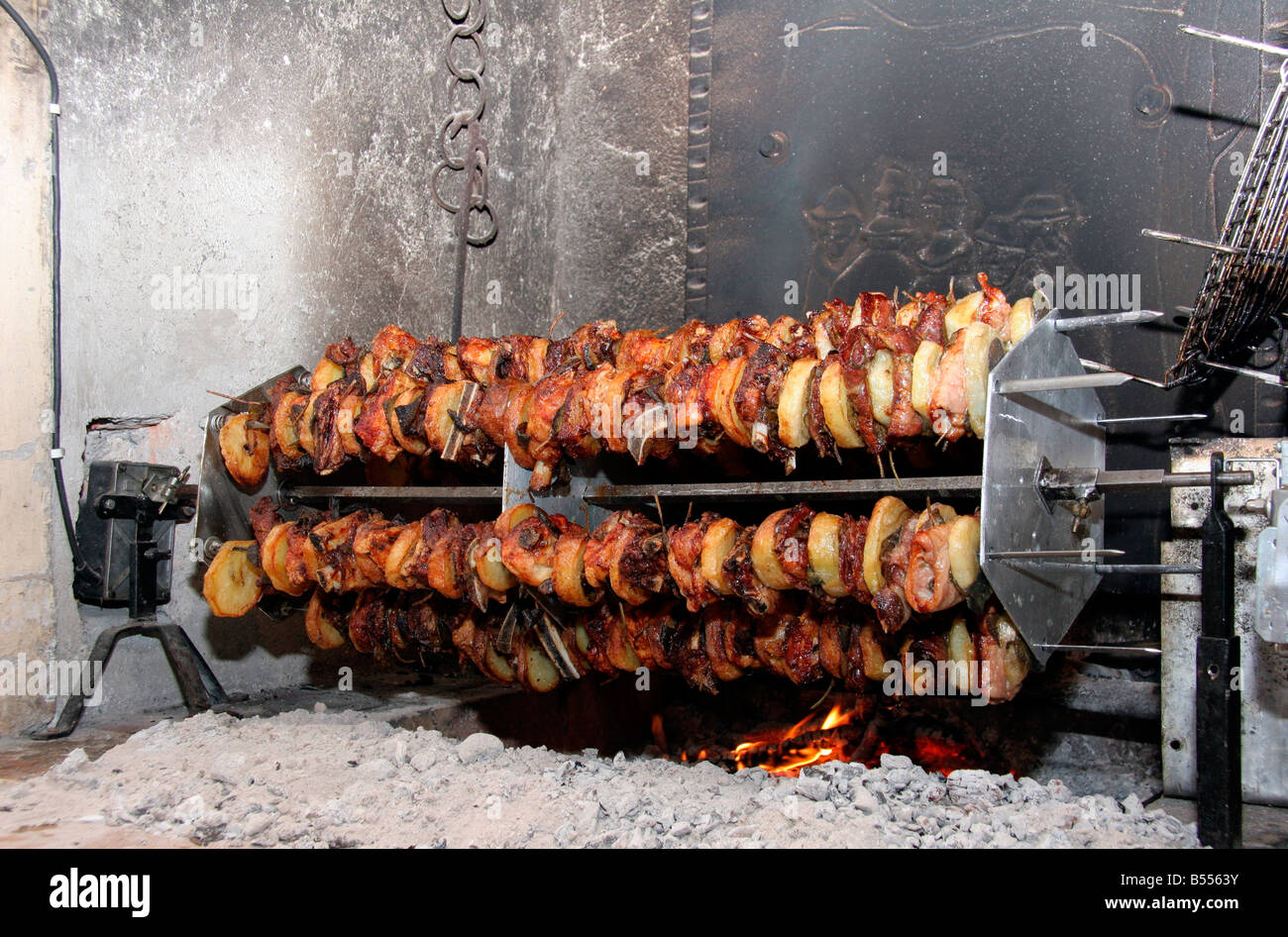 Mix di carne allo spiedo, mixed meat covered on spit Stock Photo - Alamy