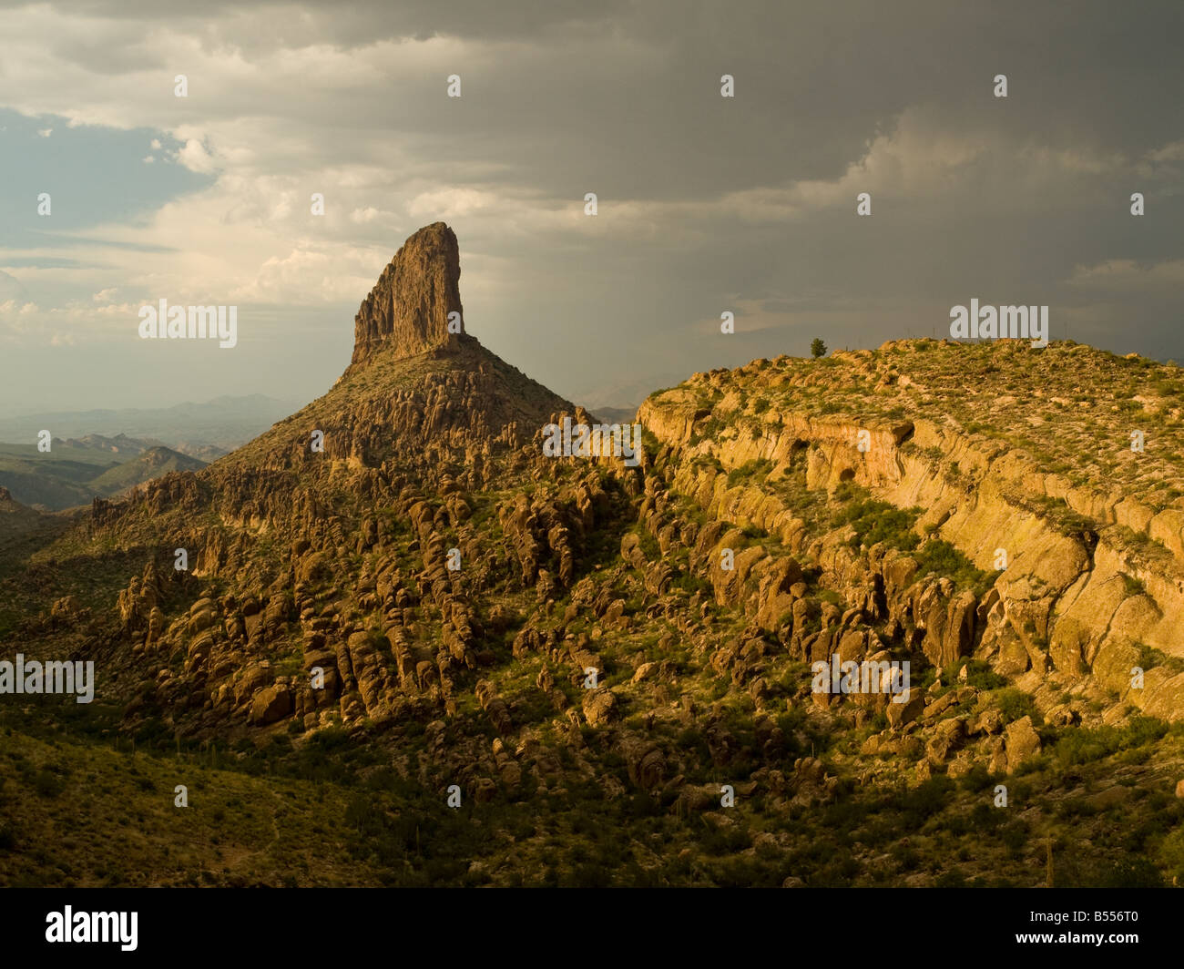 Weavers Needle, Superstition mountains during evening monsoon. Stock Photo