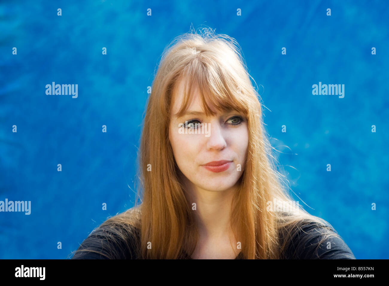 Portrait of a young woman with red hair Stock Photo - Alamy