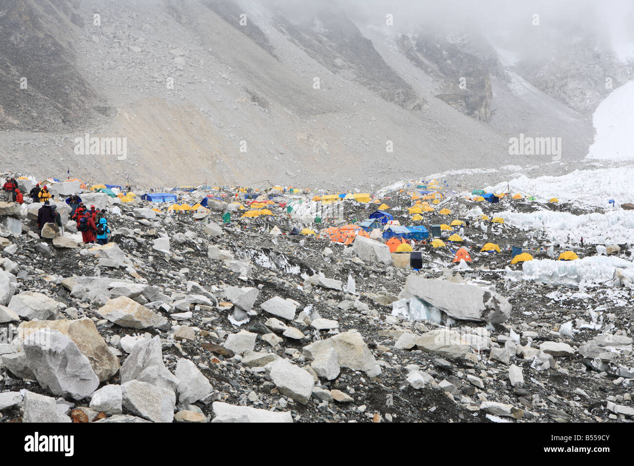 Trekkers near Everest Base Camp beside the Khumbu Glacier Stock Photo