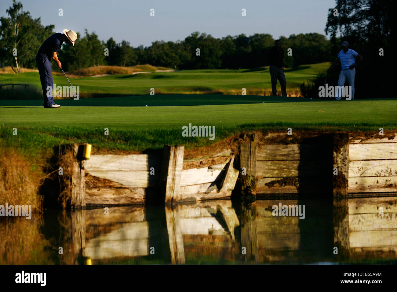 A golfer plays a hole on the Les Bordes golf course located in the