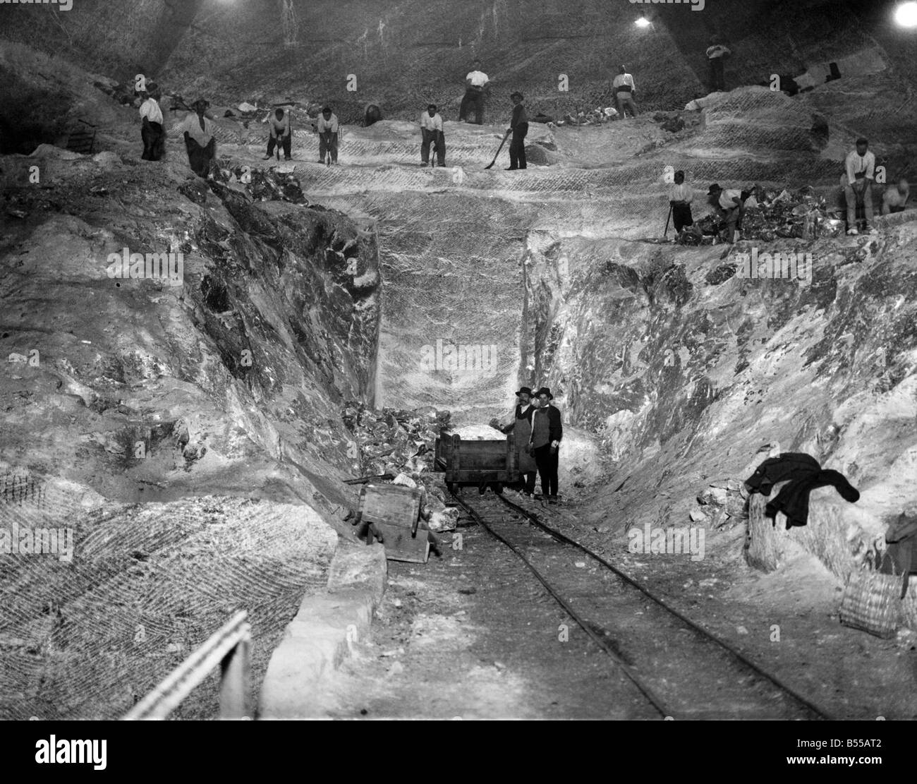 Salt mines of Romania: Having appearance of ice and snow 400 feet below surface at salt mines Slanic Romania. The workers are very healthy. Mine produces 80,000 tones a year, a State industry 500 men employed. The mine has been worked for many centuries probably by ancient Romans. January 1927 P012175 Stock Photo