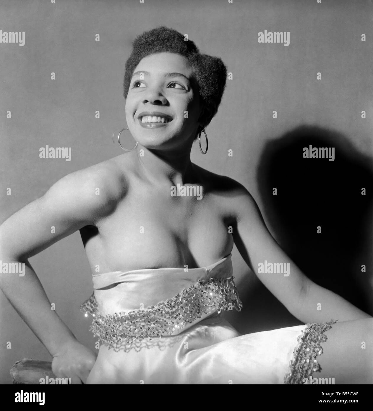 The dream of a 16 1/2 years old girl came true when after singing to the Old Comrades in Cardiff, director and producer Cliff Gordon booked her for his show 'Memories of Jolson' in Liverpool now Shirley Bassey is on the way up and who knows she may develop into another Lena Horne. September 1953 Stock Photo