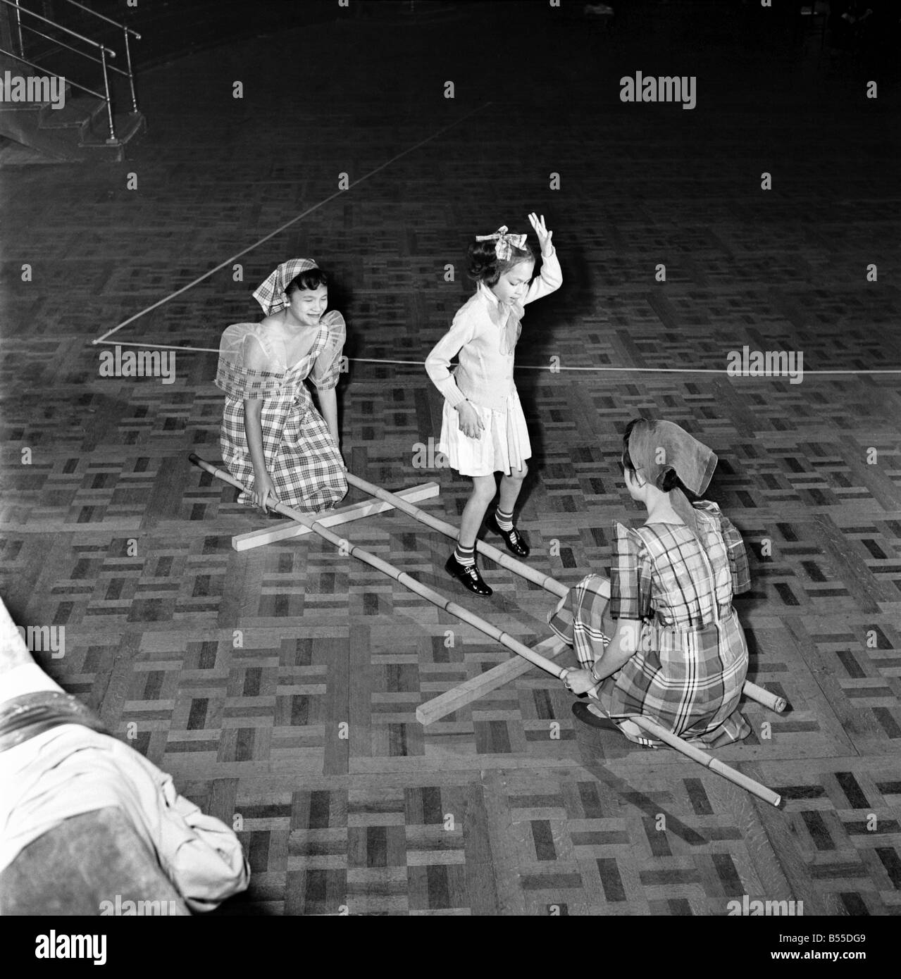 Entertainment: Dance: Folk Dancing. In this dance from the Phillipine ...