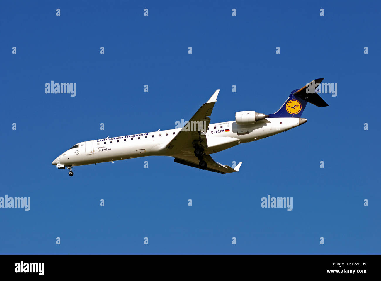 Lufthansa Regional CityLine Bombardier CRJ700 aircraft landing at Birmingham International Airport, UK Stock Photo