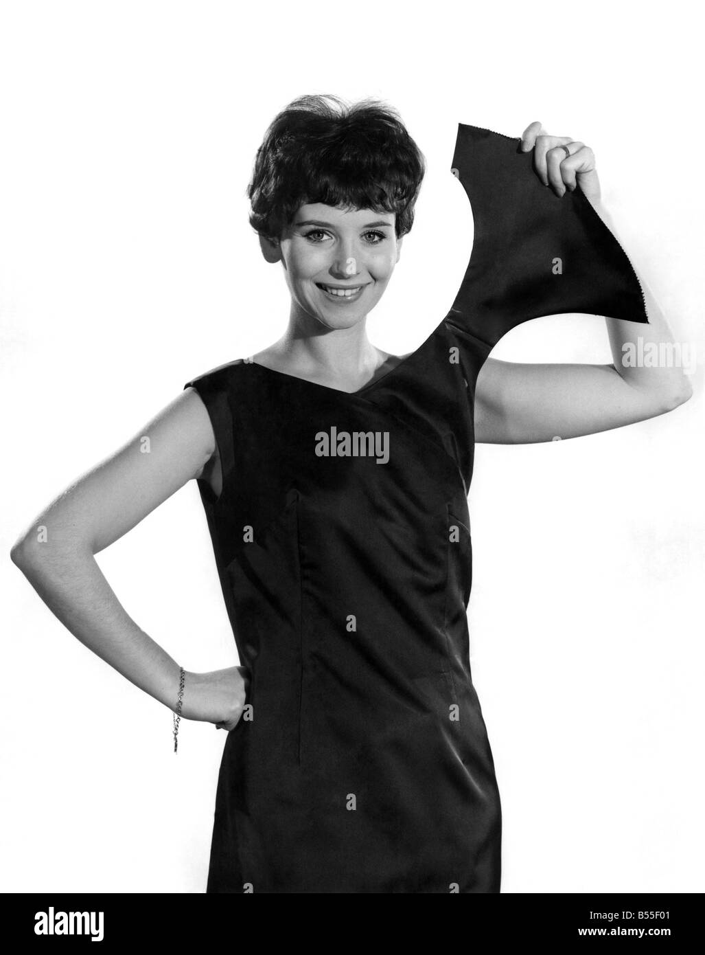 Black off shoulder dress hires stock photography and images Alamy