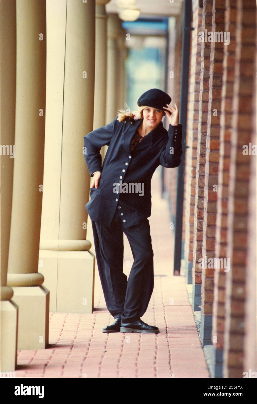 A model takes on a Charlie Chaplin pose in a suit and hat Stock Photo ...