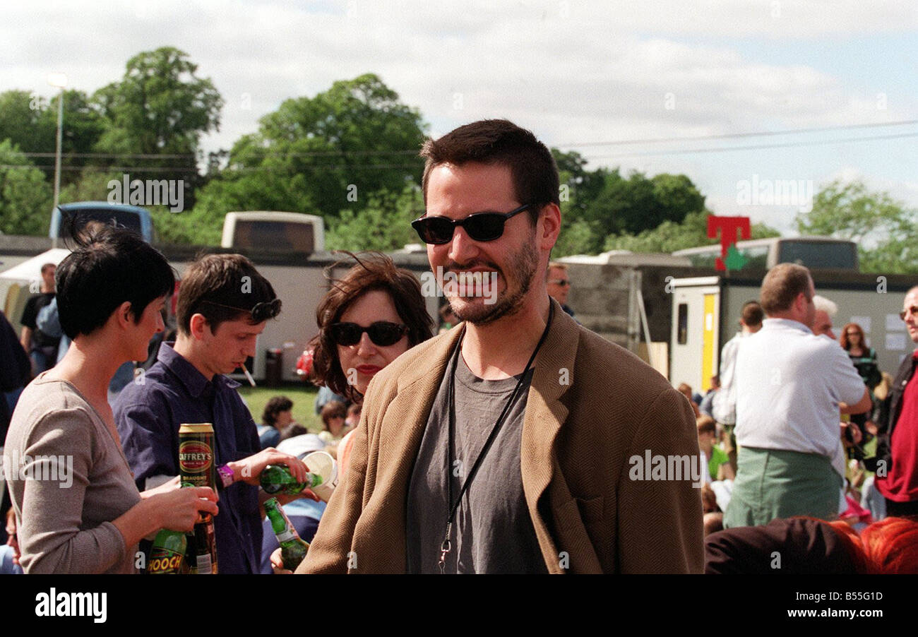 Keanu Reeves at T in the Park music Festival wearing sunglasses brown  jacket beard Stock Photo - Alamy