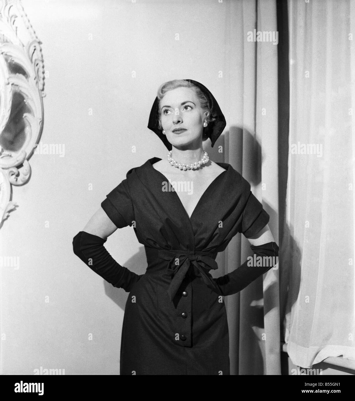 Clothing: Fashion. Christian Dior of London showed a collection of suits, coats and dressess at Maddox-st., W.1. December 1953 Stock Photo