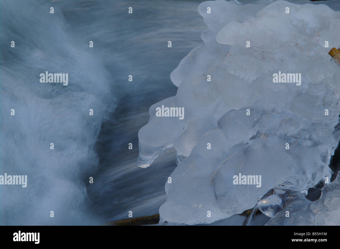 Brook Using Ice a icy waterfall in a small brook Stock Photo - Alamy