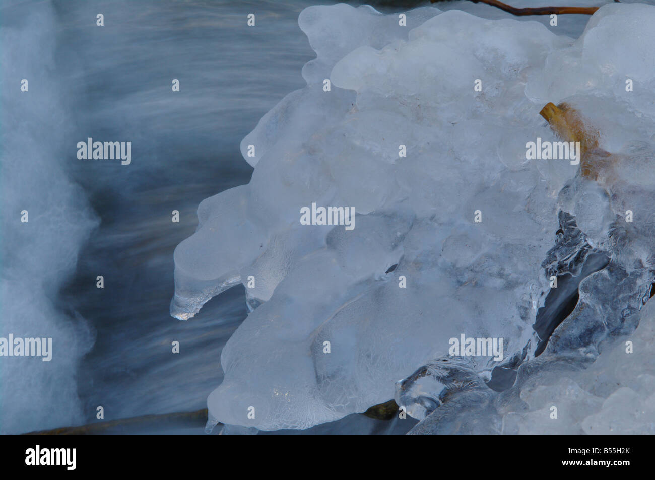 Brook Using Ice a icy waterfall in a small brook Stock Photo - Alamy
