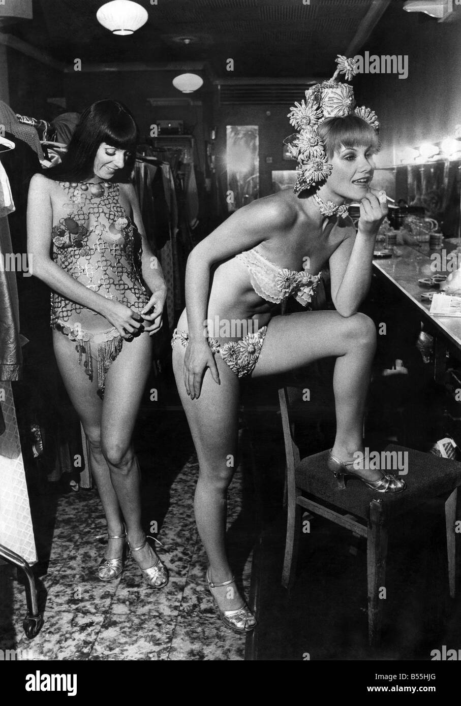 Two cabaret girls put theor make up on before going on stage. August 1975 P012715 Stock Photo