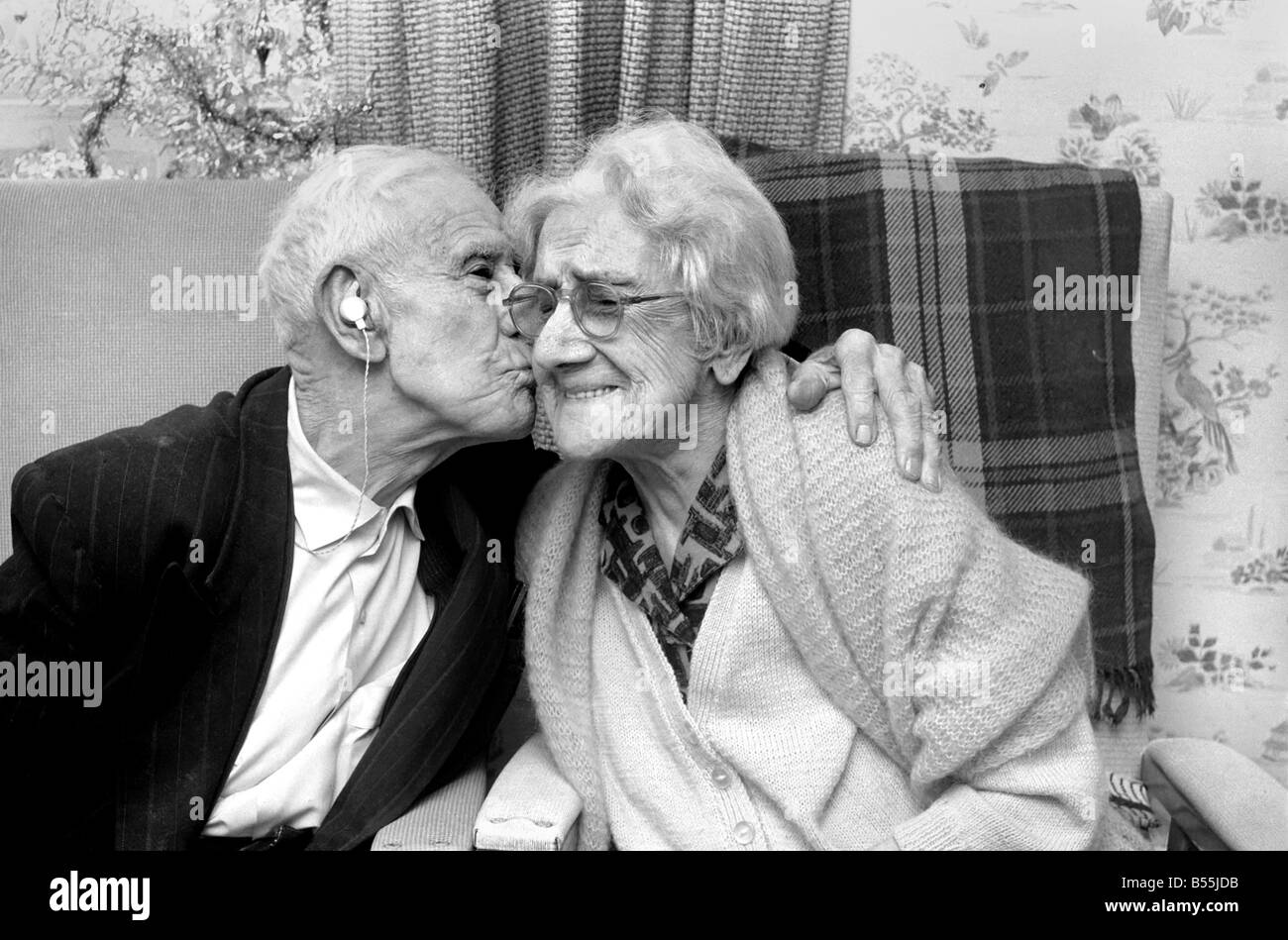 Love and Romance: Elderly Couple. Mr. David Harrington, 99, and his wife, Elizabeth, 100, celebrate their 76th wedding anniversary at the Mayesbrook Old Folks Home, Bevean Ave, Barking, on Christmas Day. December 1969 Z12290-003 Stock Photo