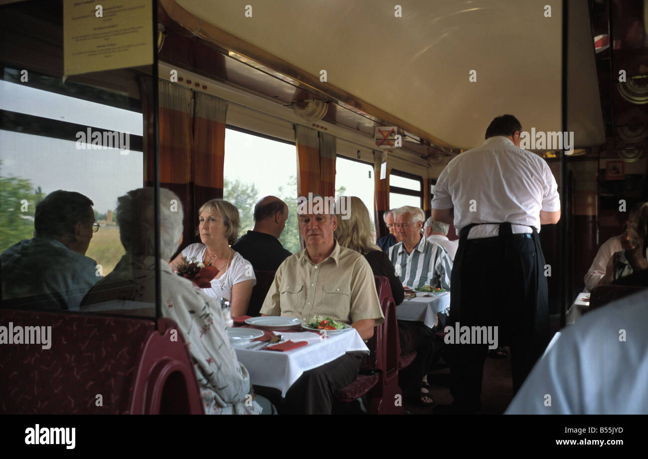 The dining car restaurant on an international train between hungary and germany Stock Photo