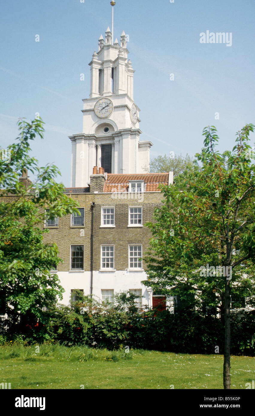 Tower of St Anne, Limehouse, from the west, with C18 houses of Newell St in front. Stock Photo