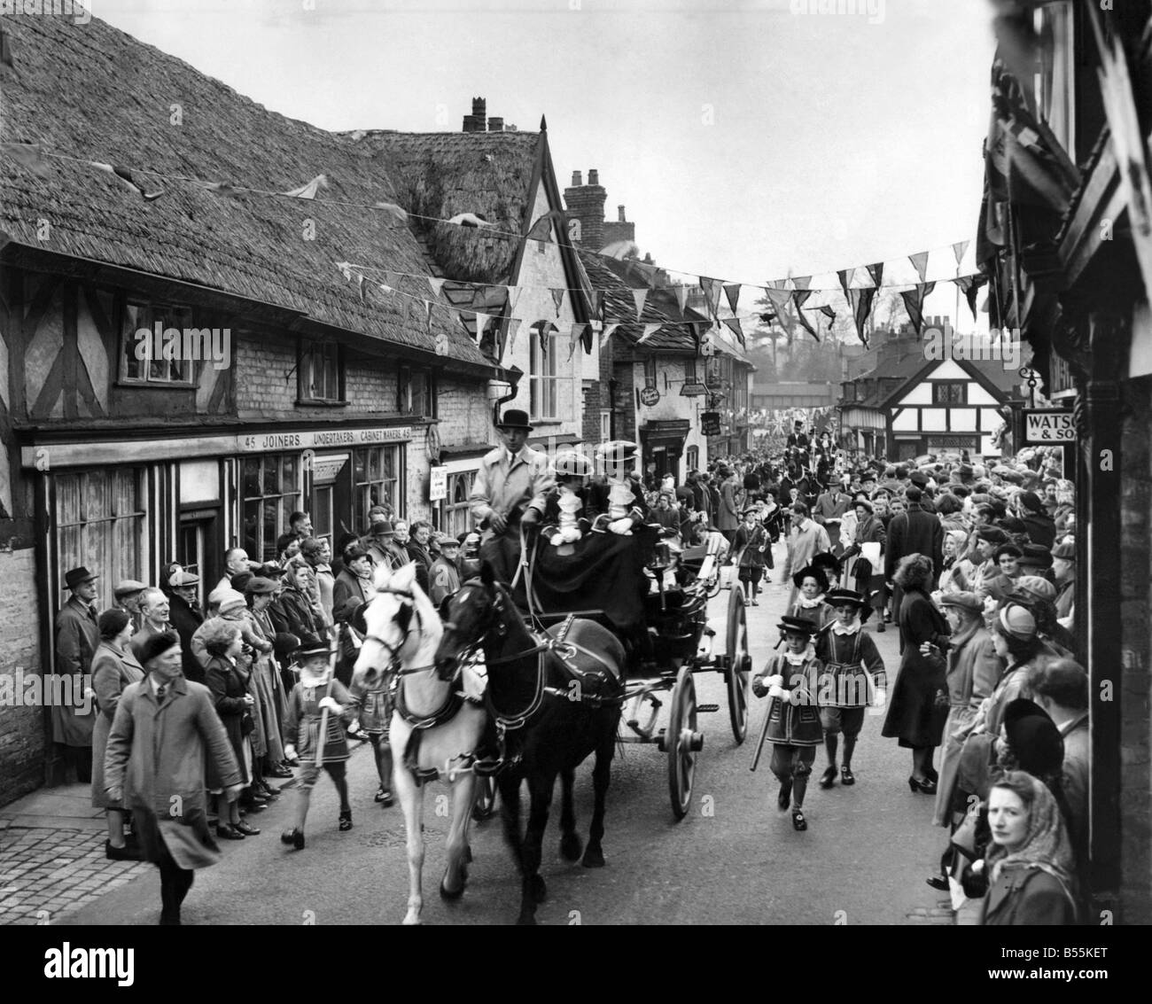 Knutsford May Festival. The royal coach passing through the street of