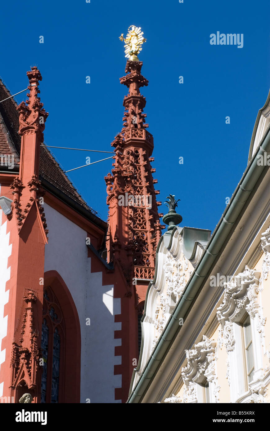 detail of the rich decorated facade of the falcon house and Marienkapelle in Wuerzburg Bavaria Germany Stock Photo