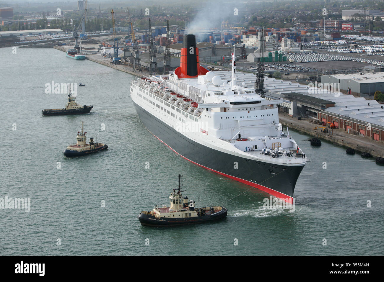 Queen Elizabeth 2 QE2 leaving the port of Southampton on her final world cruise before being turned into a hotel. Stock Photo