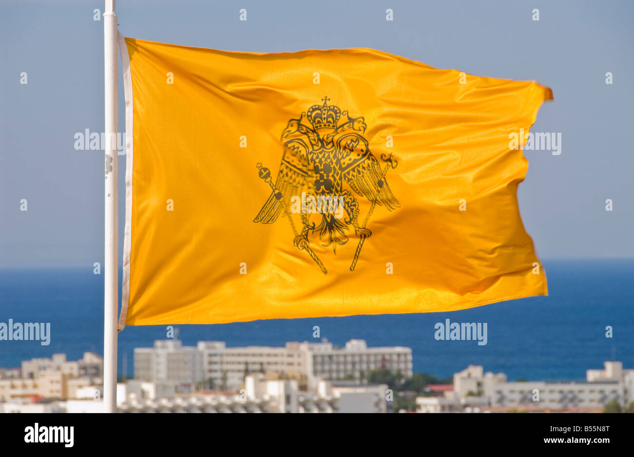 Greek Orthodox Church flag flying over Protaras on the Eastern Mediterranean island of Cyprus EU Stock Photo