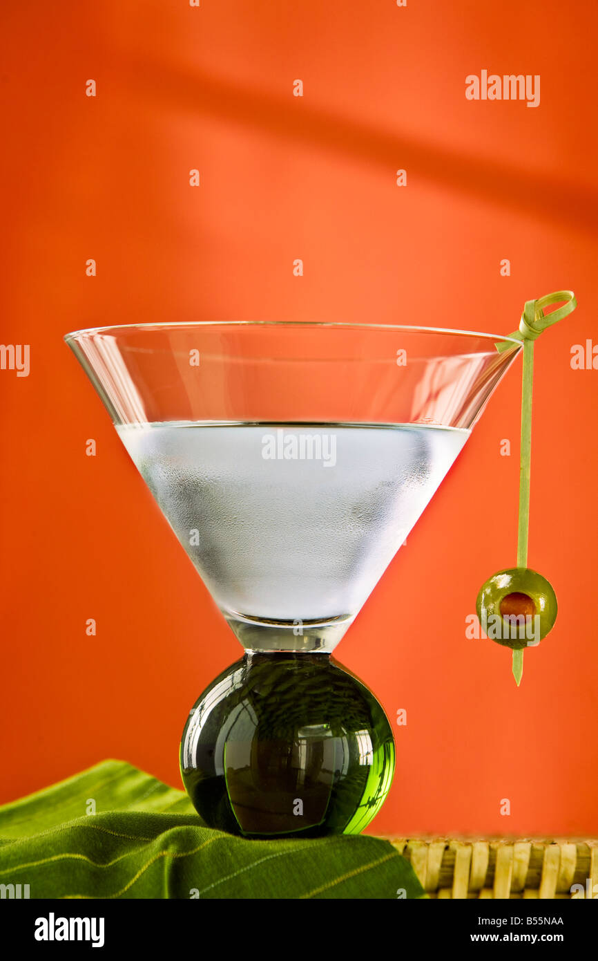 martini glass with olive Stock Photo Alamy