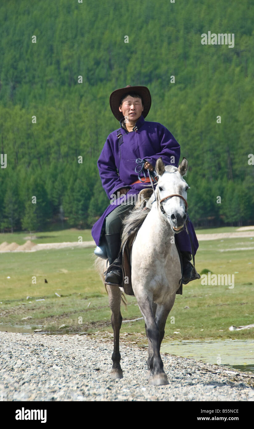 Mongolian nomad galloping in the steppes Stock Photo - Alamy