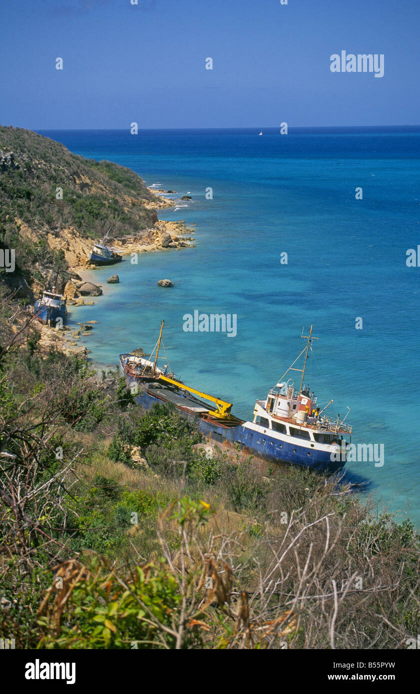 DAmaged fishing boats swept onto the beach by Hurricane Luis in 1995