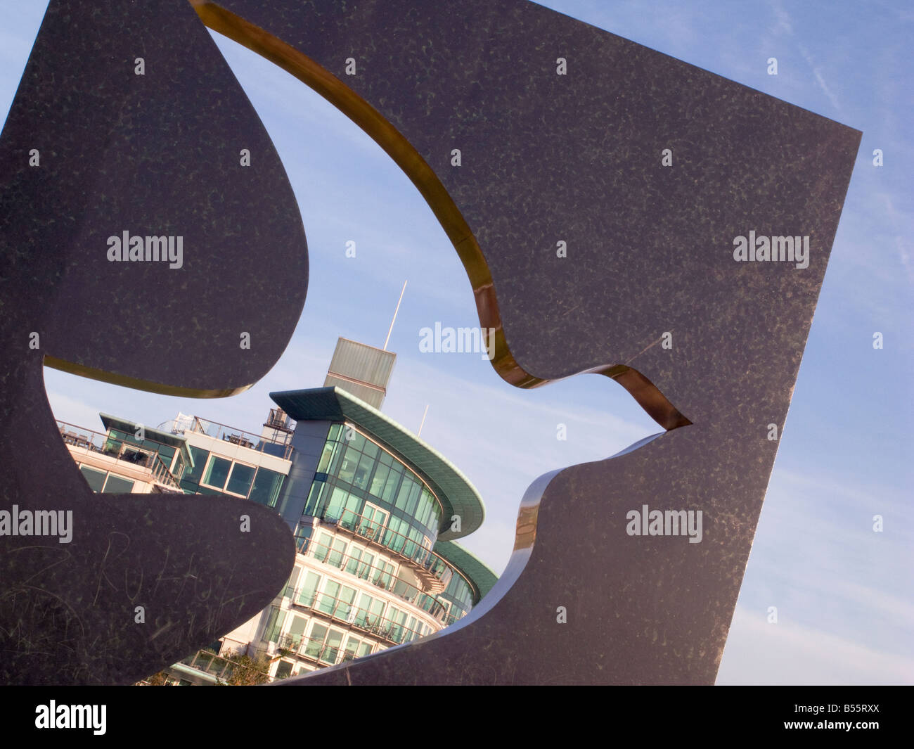 Dove of peace statue by luxury flats by Thames near St Katherines Dock