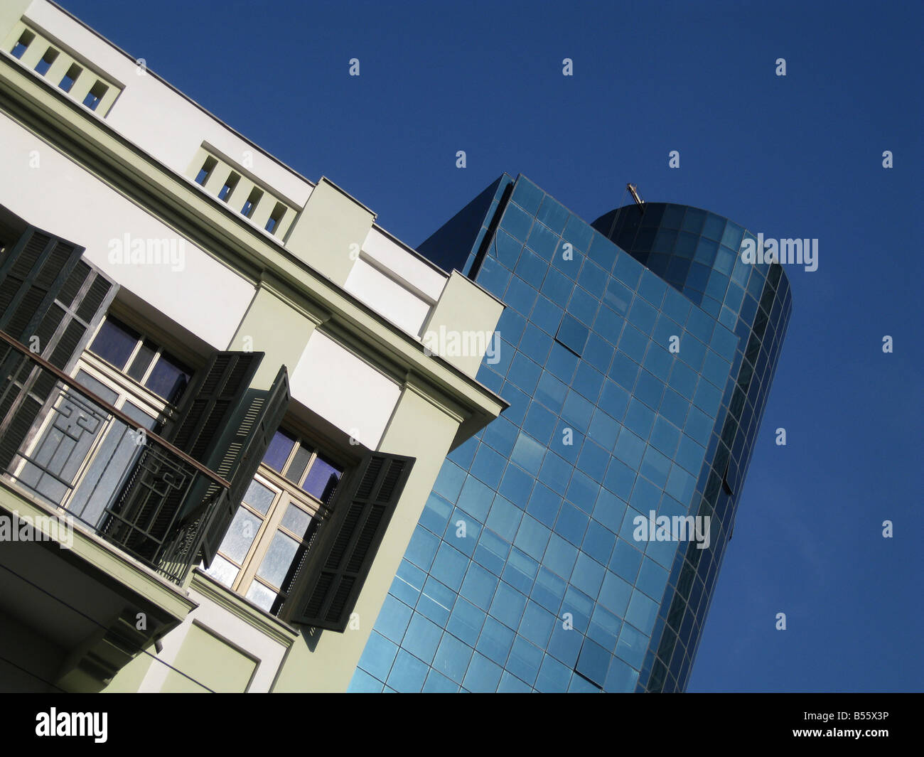 New luxury business building stands in stark contrast to an old