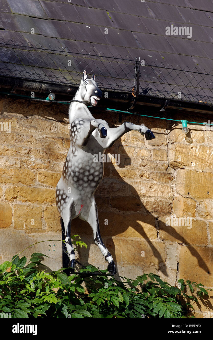 Horse on outside wall of Toy Shop High Street Moreton in Marsh