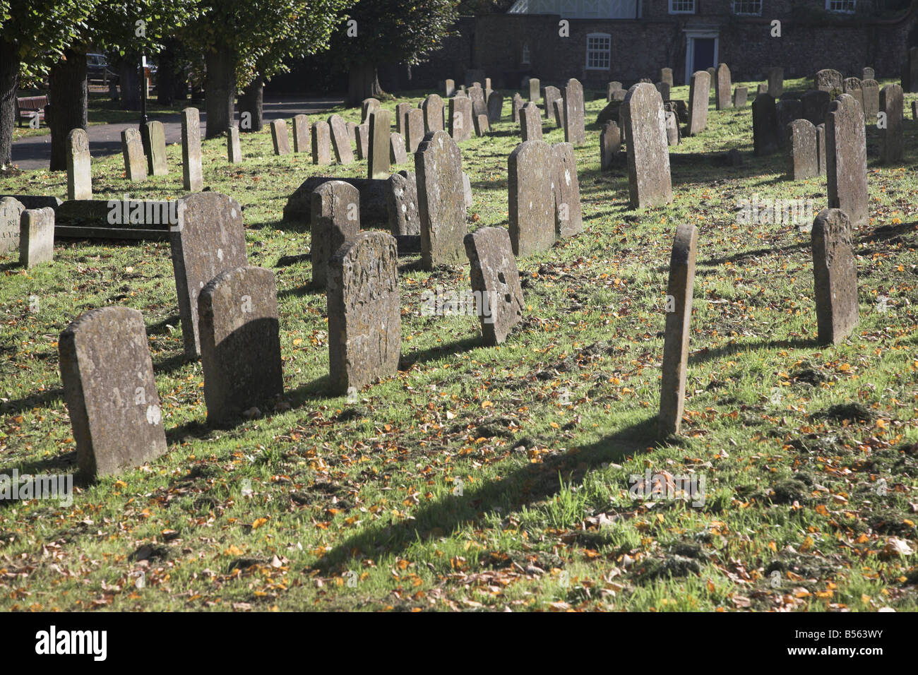 Ancient gravestones in churchyard Bury St Edmunds Suffolk England Stock Photo
