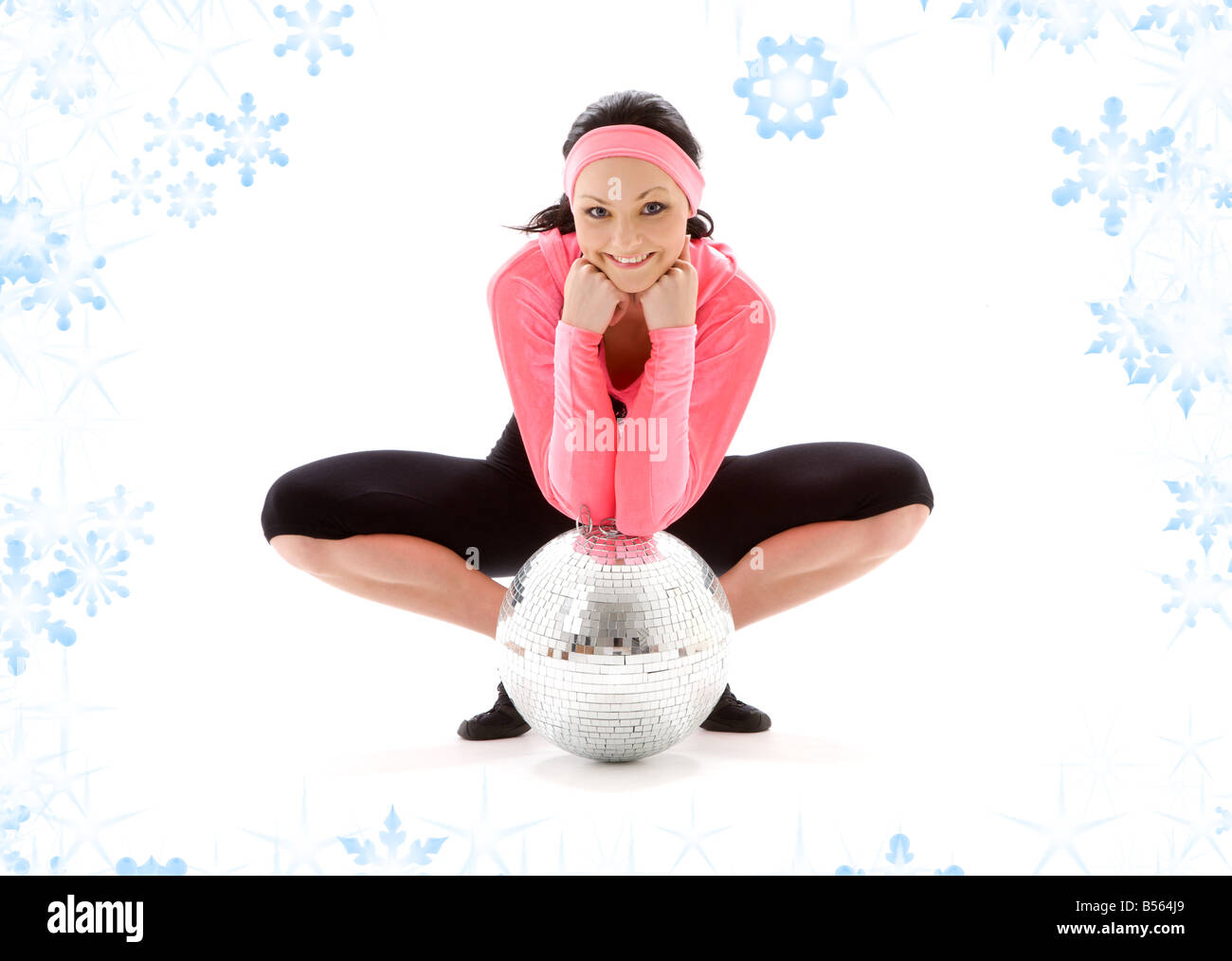picture of dancer girl with glitterball and snowflakes Stock Photo