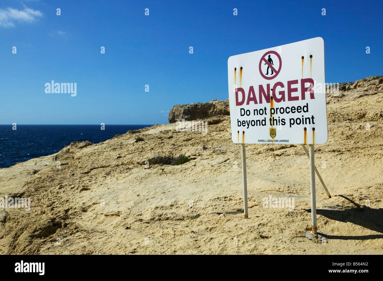 Dangerous Cliffs, danger sign near the Azure Window, Gozo, Malta Stock