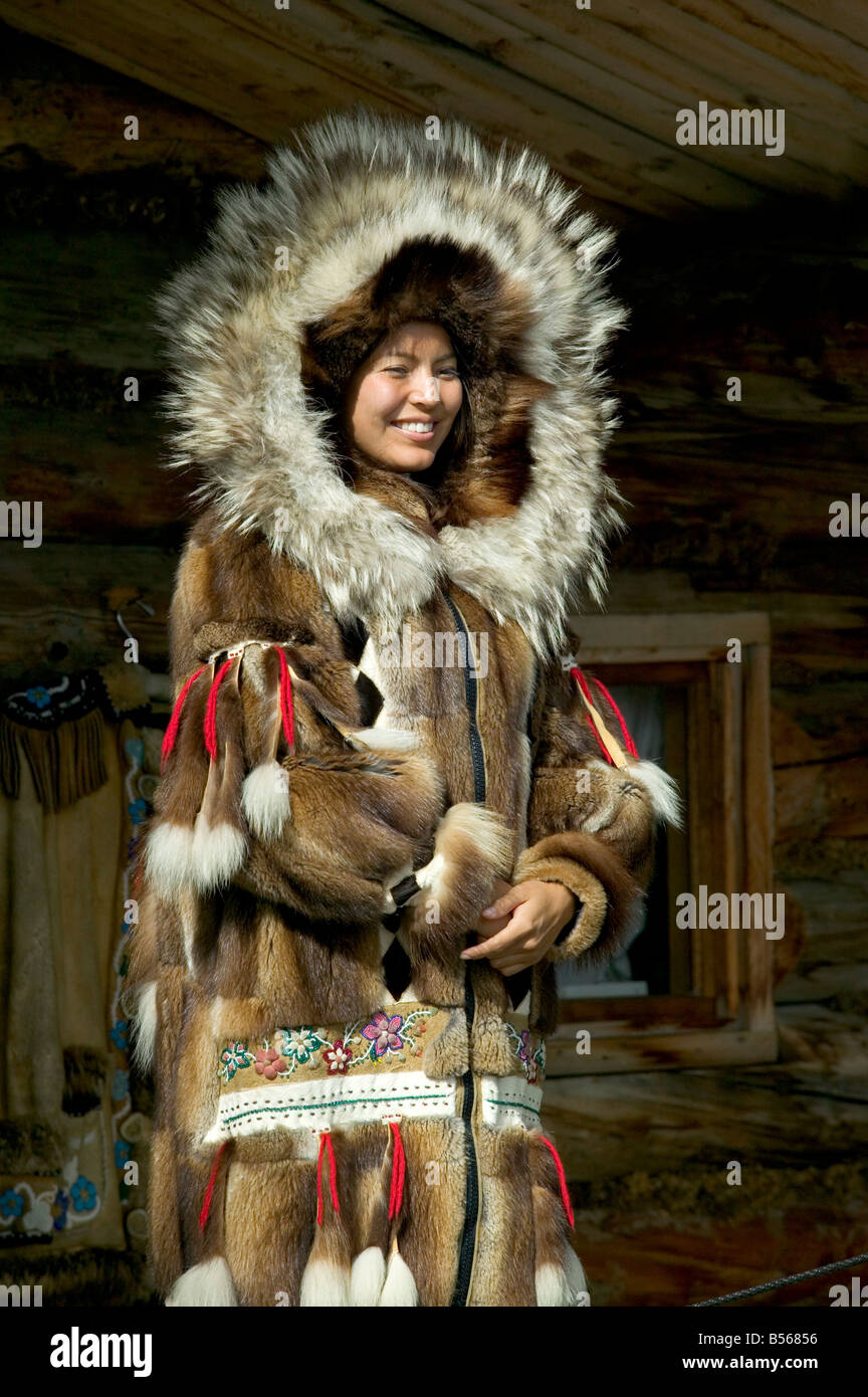 An Athabaskan indian girl models a handmade fur parka in Alaska Stock Photo  - Alamy
