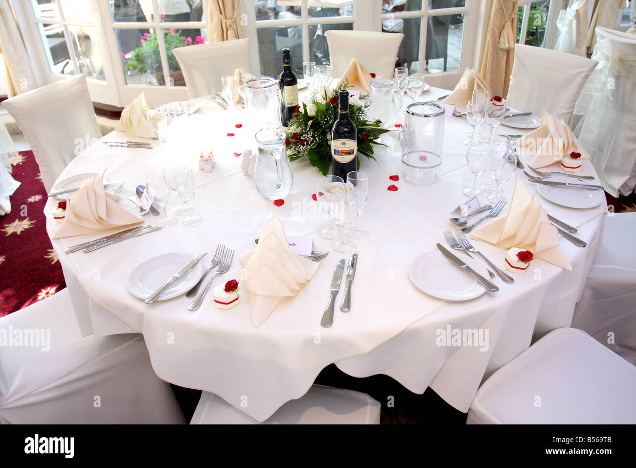 Table made up for wedding reception dinner Stock Photo Alamy