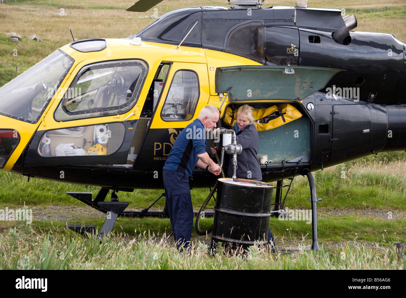 Twin Squirrel helicopter G NETR in the western Isles conducting SMRU Seal Count Stock Photo