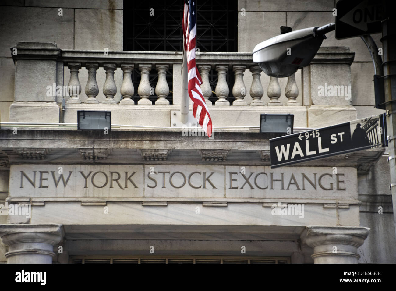 New York Stock Exchange rear entrance and Wall Street sign Stock Photo